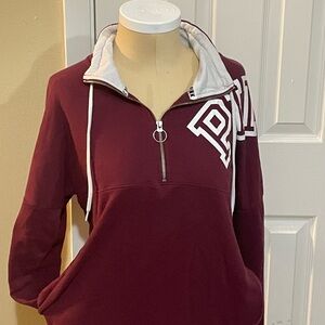 Maroon Varsity half zip draw string mock neck pull over. 60% cotton 40% poly